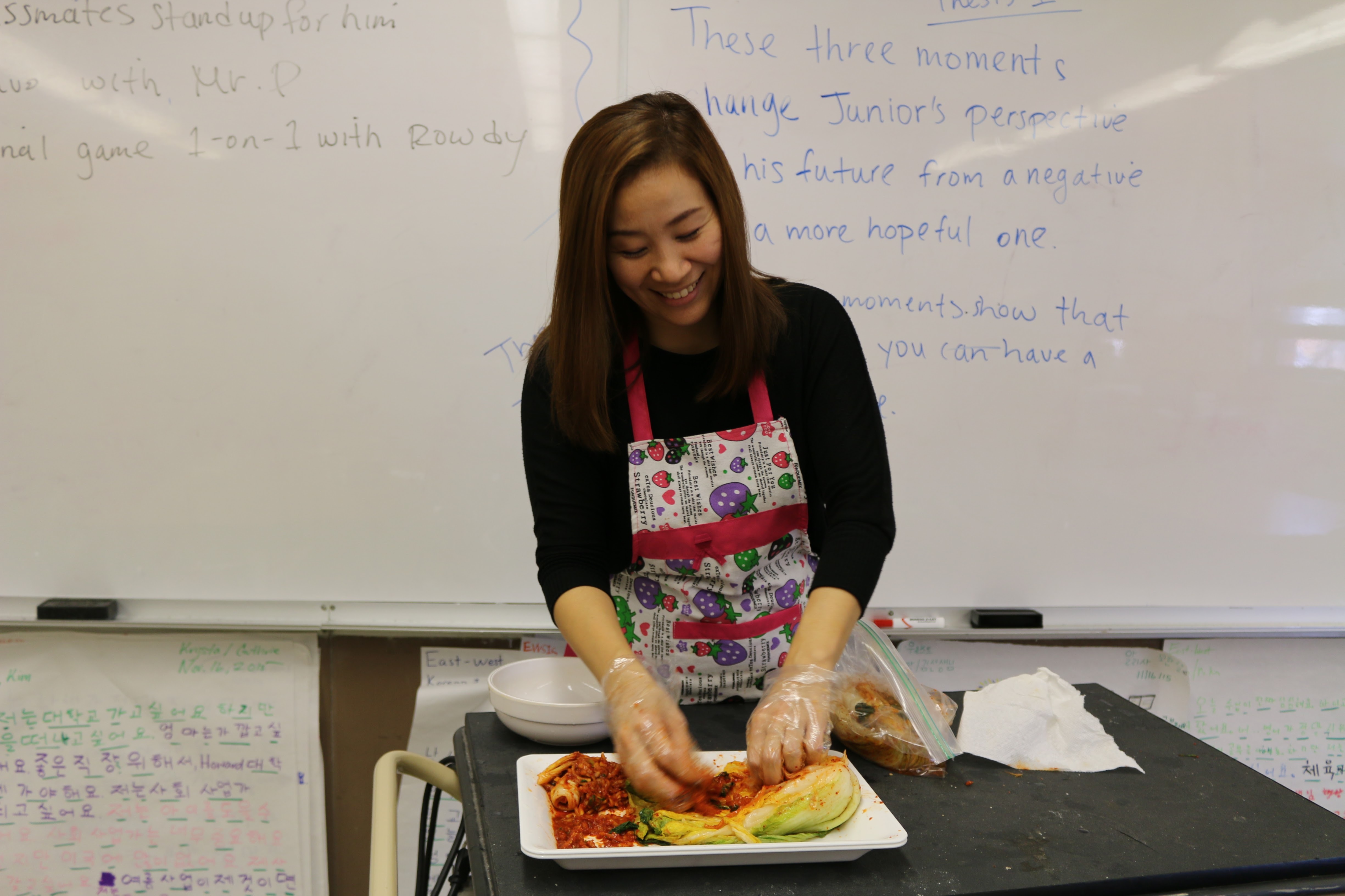 East-West's own Top Chef, Mrs. Kim, leads Kimjang.